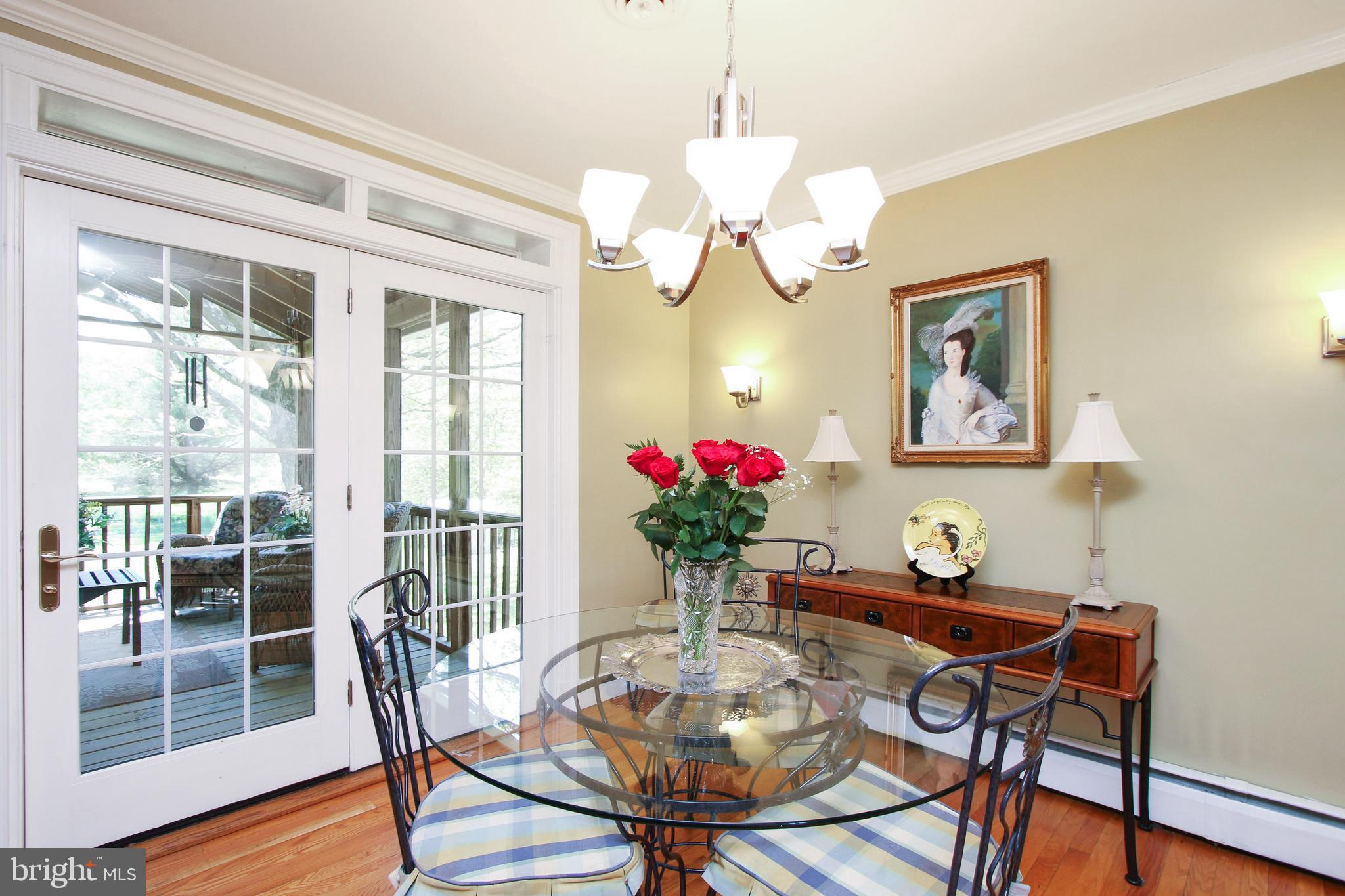 8409 West Grove Road Ellicott City, MD 21043 - Photo 6 of 35 Dining Area with French Doors to Screened-In Porch