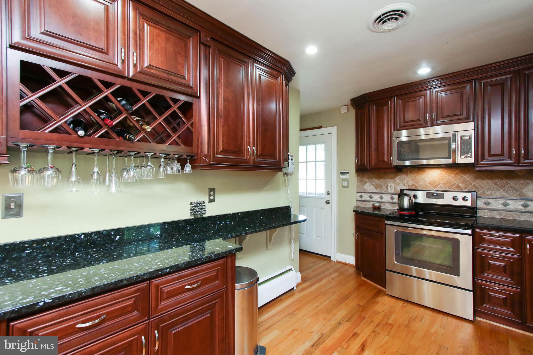 8409 West Grove Road Ellicott City, MD 21043 - Photo 7 of 35 Updated Kitchen with cherry cabinetry