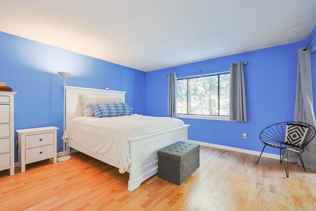 276 Trailside Way, Unit 276 Ashland, MA 01721 - Photo 15 of 32 a bedroom with a bed and a window