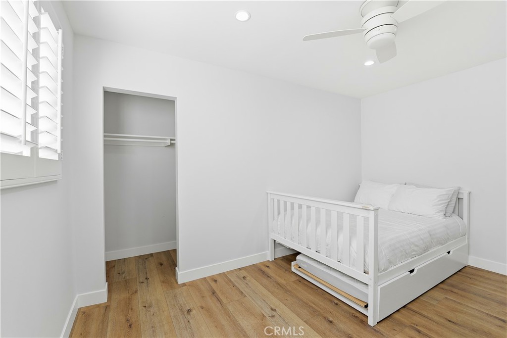 10560 Limerick Avenue Chatsworth, CA 91311 - Photo 22 of 43 a view of a room with wooden floor