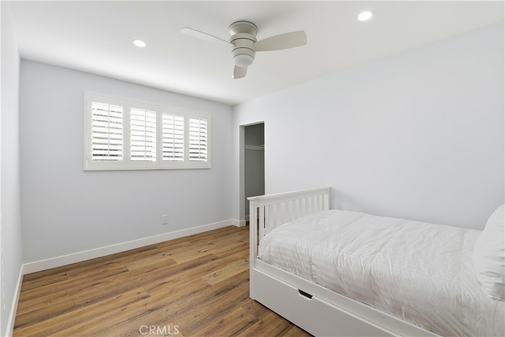 10560 Limerick Avenue Chatsworth, CA 91311 - Photo 23 of 43 a bedroom with a bed and a window