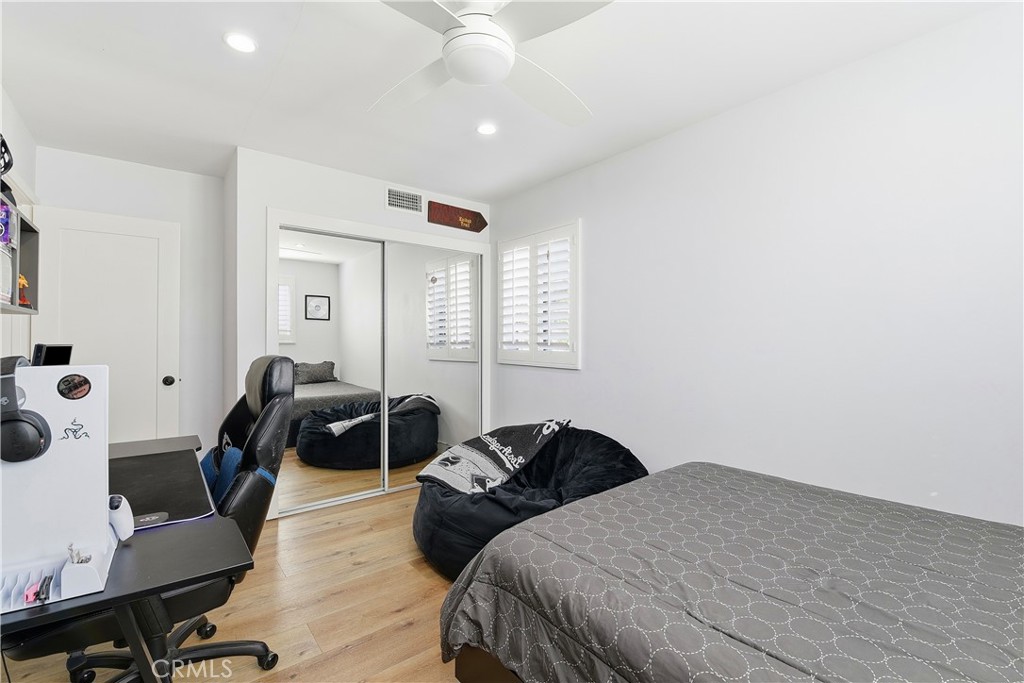 10560 Limerick Avenue Chatsworth, CA 91311 - Photo 26 of 43 a bedroom with a bed and a window