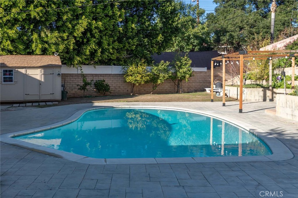 10560 Limerick Avenue Chatsworth, CA 91311 - Photo 36 of 43 an outdoor view of house with outdoor space