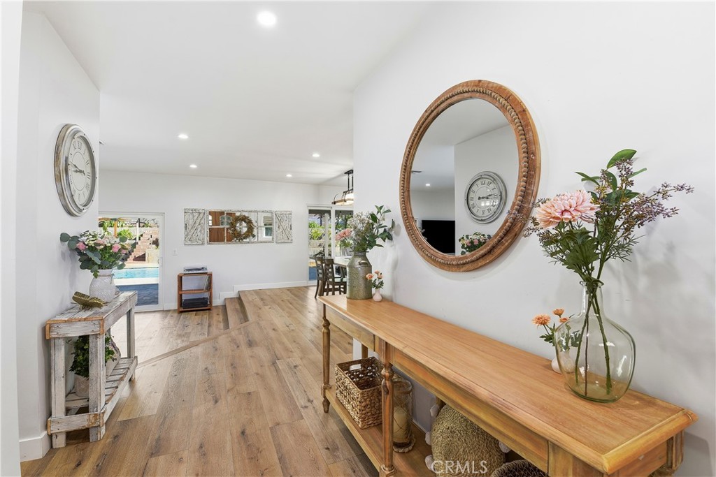 10560 Limerick Avenue Chatsworth, CA 91311 - Photo 4 of 43 a living room with furniture and a mirror