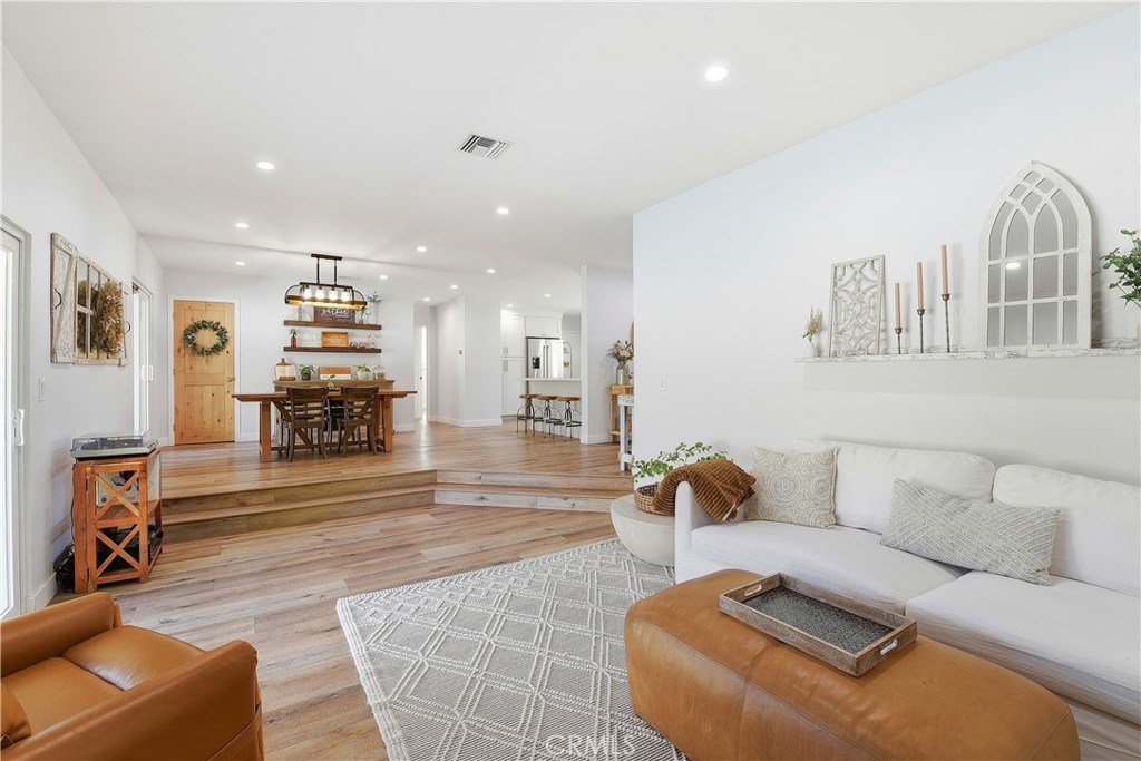 10560 Limerick Avenue Chatsworth, CA 91311 - Photo 9 of 43 a living room with furniture and a couch