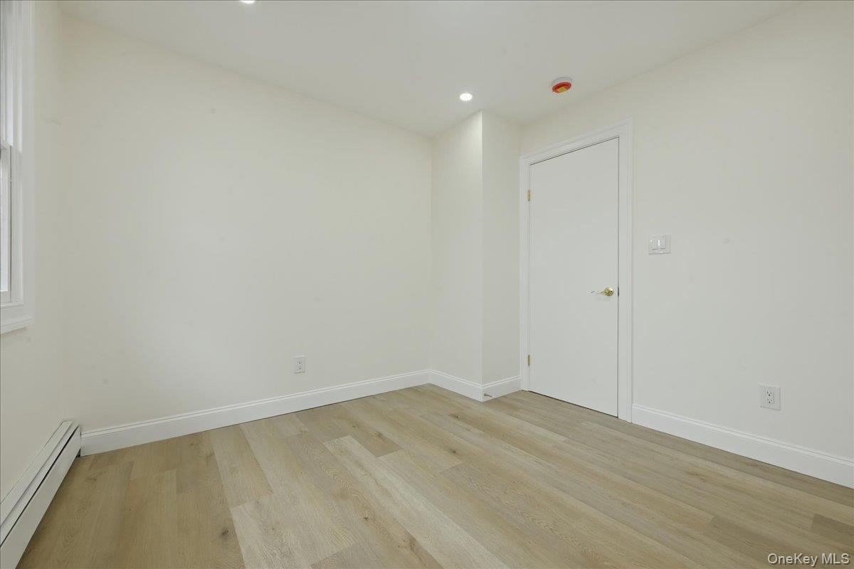 84 North Fordham Road Hicksville, NY 11801 - Photo 15 of 28 a view of an empty room