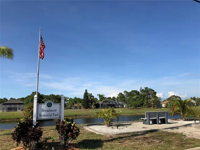 a view of a brick building with many windows