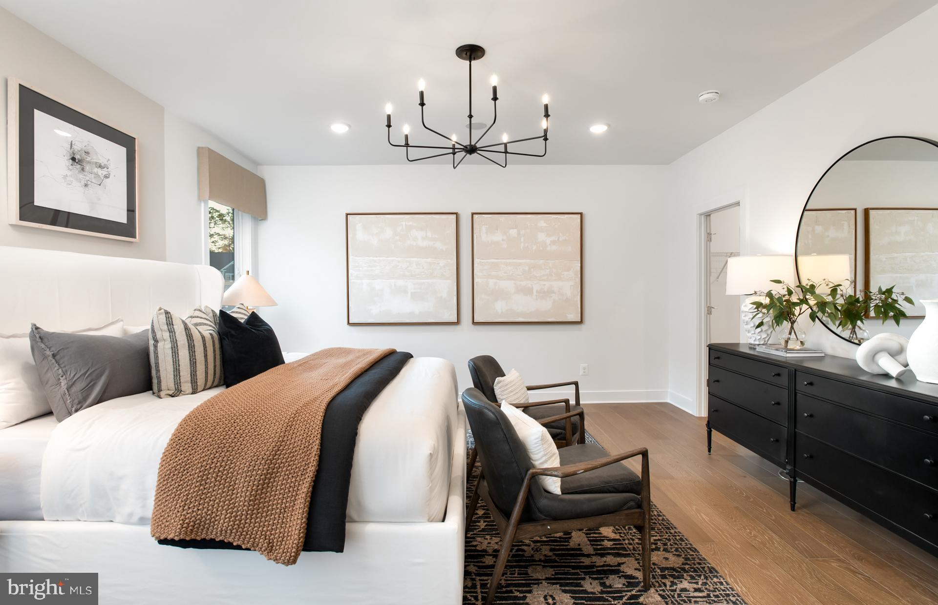 18278 Cresswell Rst Lane Leesburg, VA 20176 - Photo 27 of 63 a living room with furniture a chandelier and a chandelier