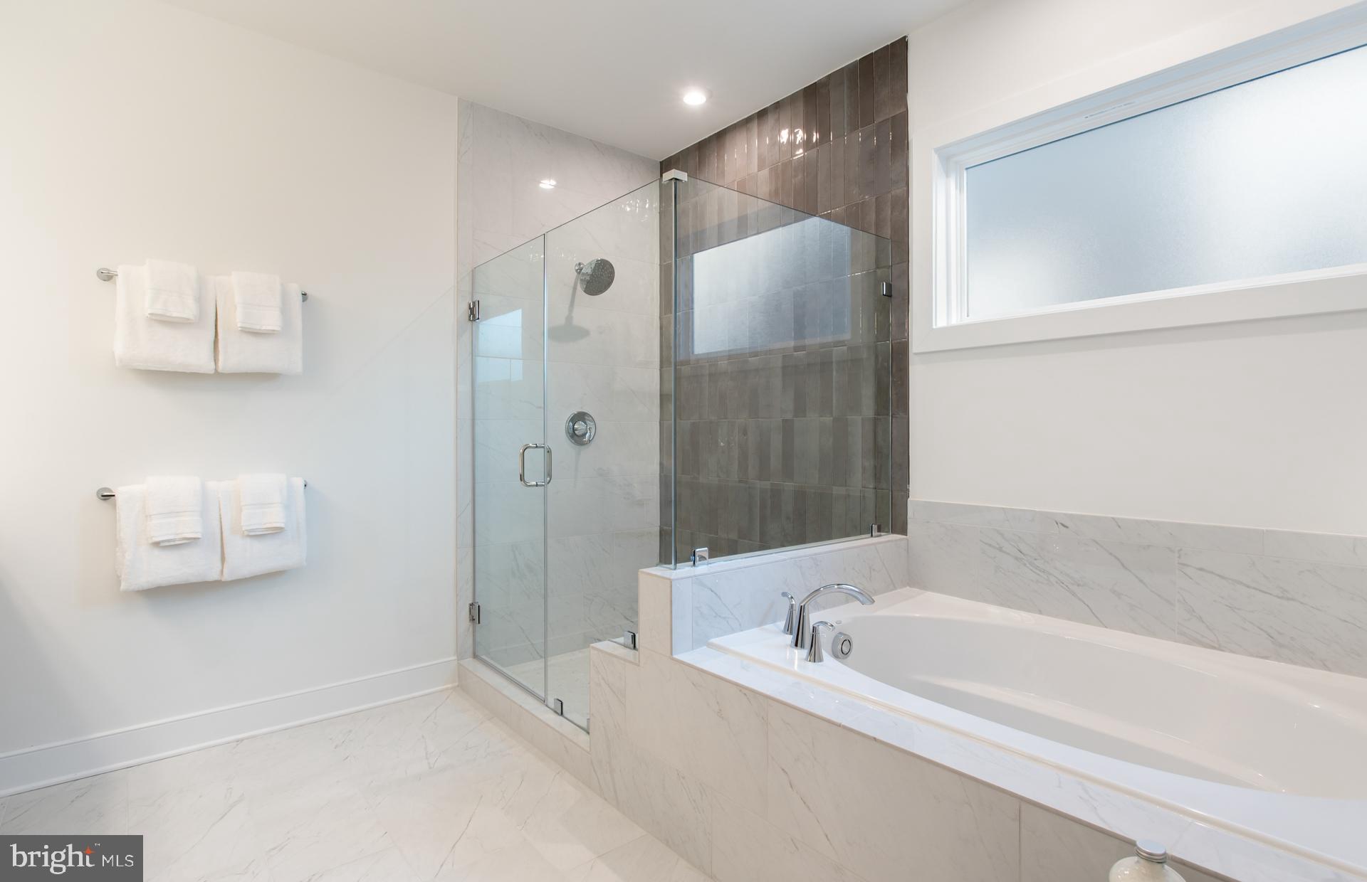 18278 Cresswell Rst Lane Leesburg, VA 20176 - Photo 29 of 63 a bathroom with a bathtub and a shower