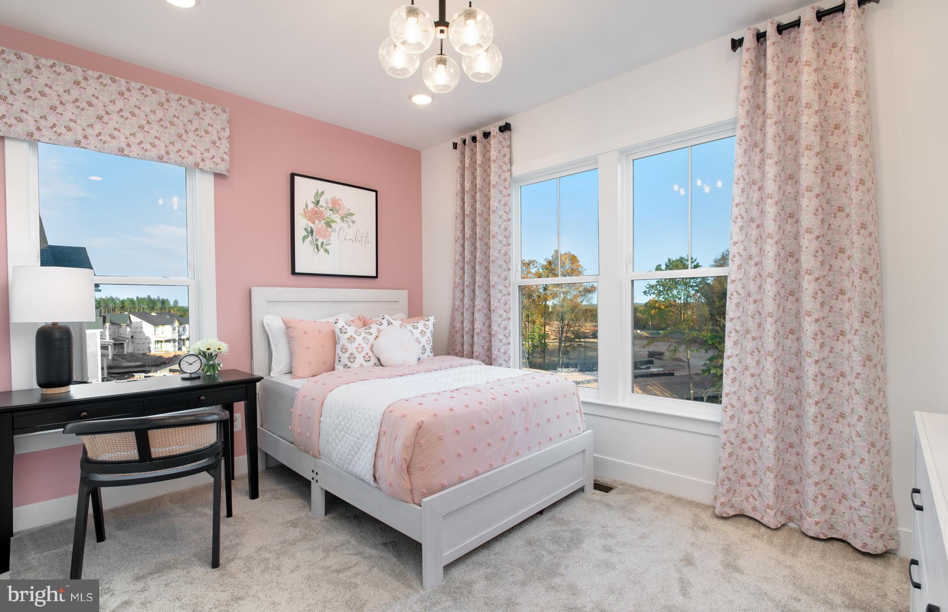 18278 Cresswell Rst Lane Leesburg, VA 20176 - Photo 36 of 63 a spacious bedroom with a bed and a table