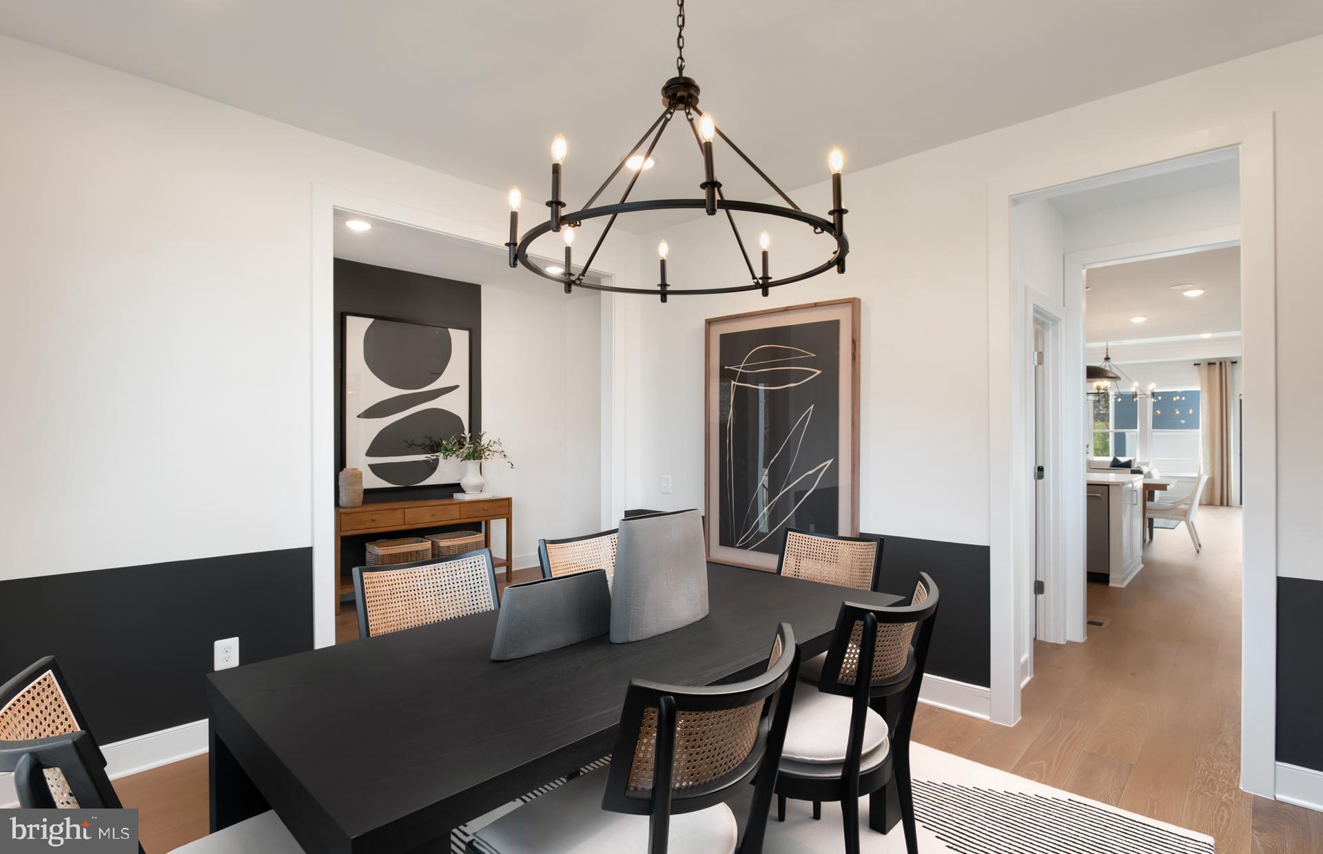18278 Cresswell Rst Lane Leesburg, VA 20176 - Photo 8 of 63 a view of a dining room with furniture and wooden floor