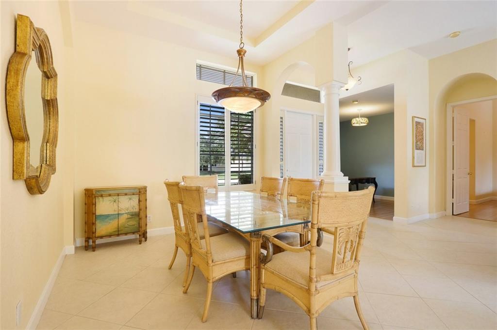 767 Southwest River Bend Circle Stuart, FL 34997 - Photo 20 of 36 a dining room with furniture and window