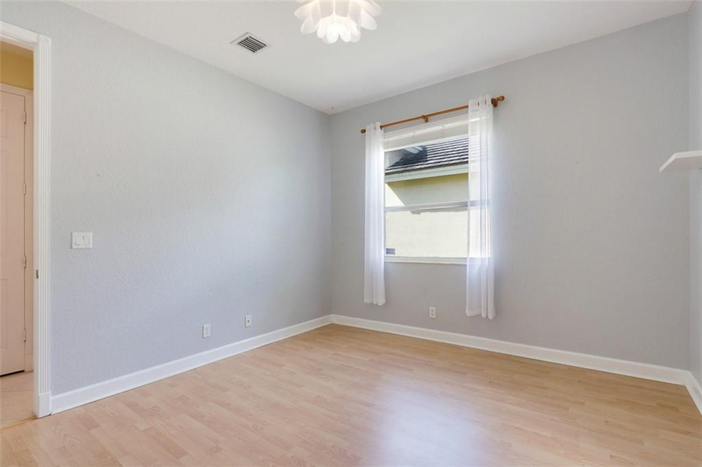 767 Southwest River Bend Circle Stuart, FL 34997 - Photo 30 of 36 a view of an empty room with a window
