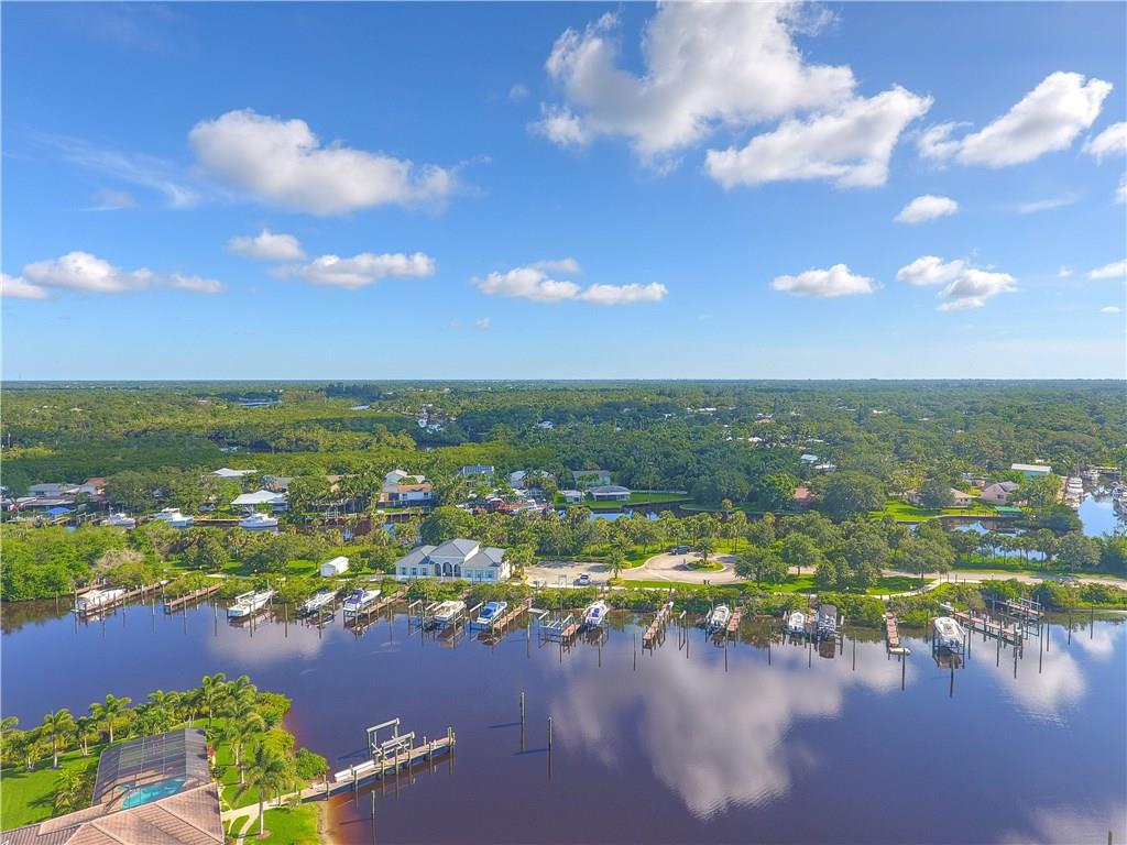 767 Southwest River Bend Circle Stuart, FL 34997 - Photo 34 of 36 a view of a lake with a houses