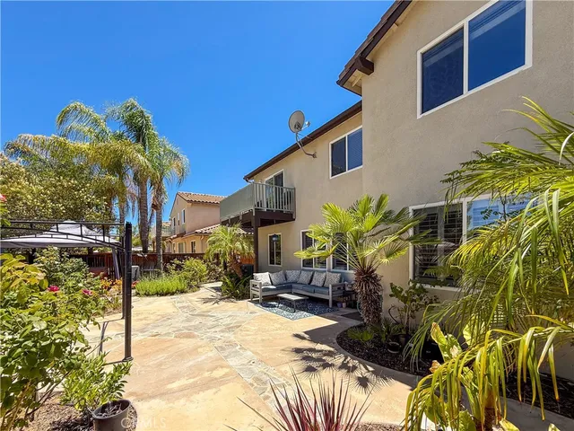a view of a house with a patio