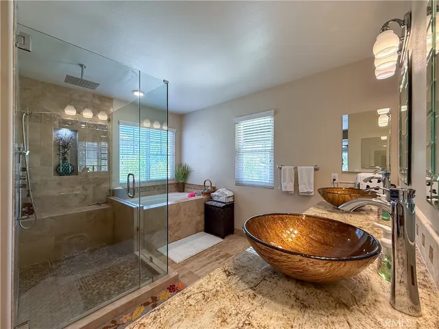 a room with furniture a window and chandelier