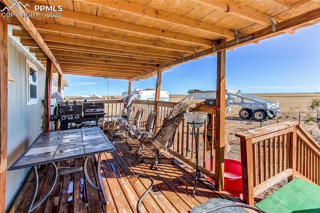 5955 Mulberry Road Calhan, CO 80808 - Photo 23 of 25 a view of outdoor space with seating space