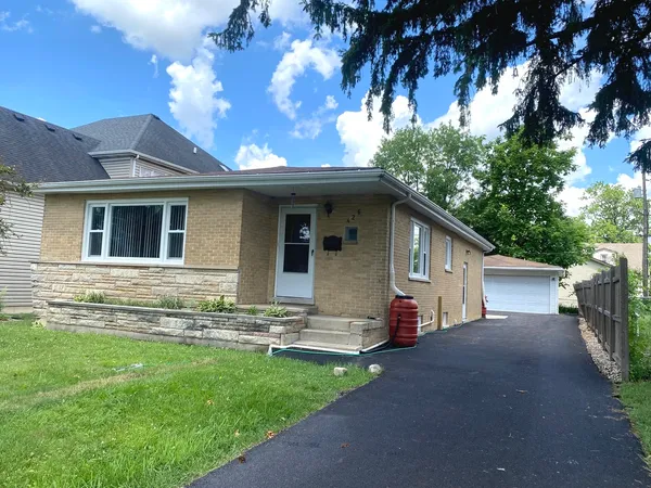 a front view of house with yard