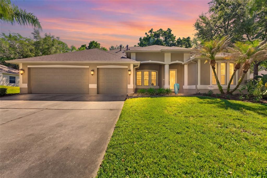 front view of a house with a yard