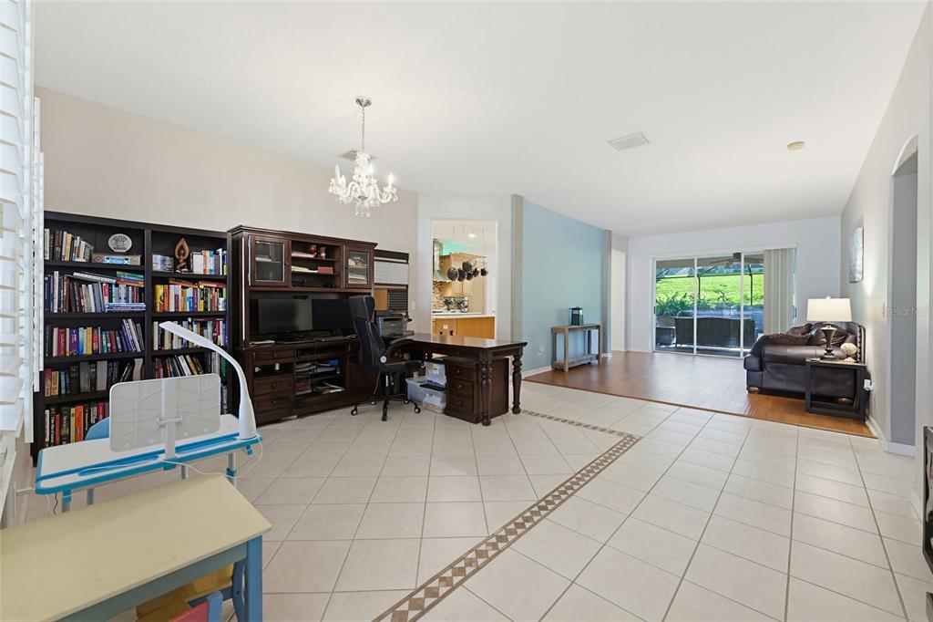 62 Camelot Ridge Drive Brandon, FL 33511 - Photo 8 of 71 a living room with furniture a window and a flat screen tv