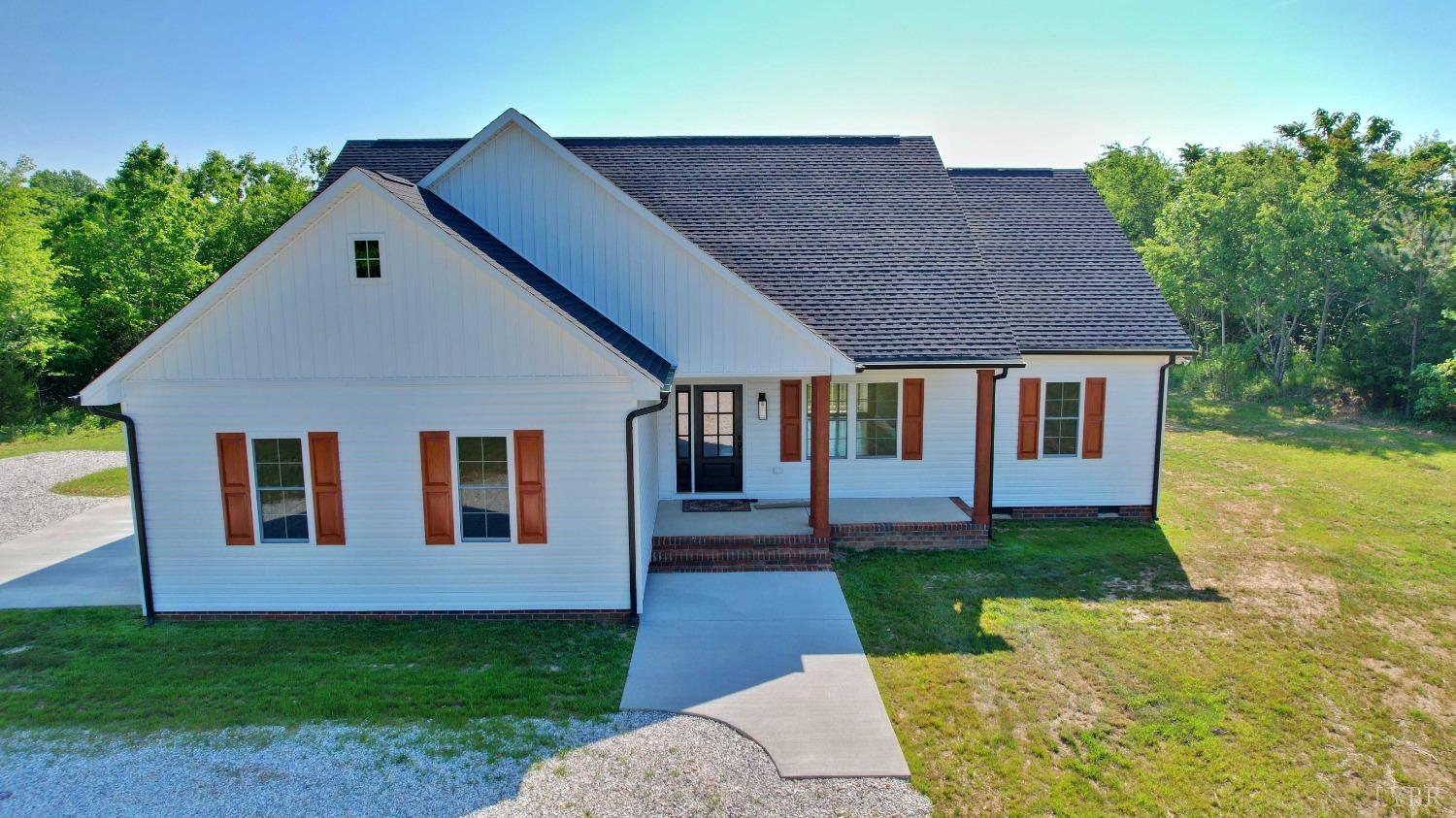 3370 Promise Land Road Appomattox, VA 24522 - Photo 3 of 29 a front view of house with yard and green space