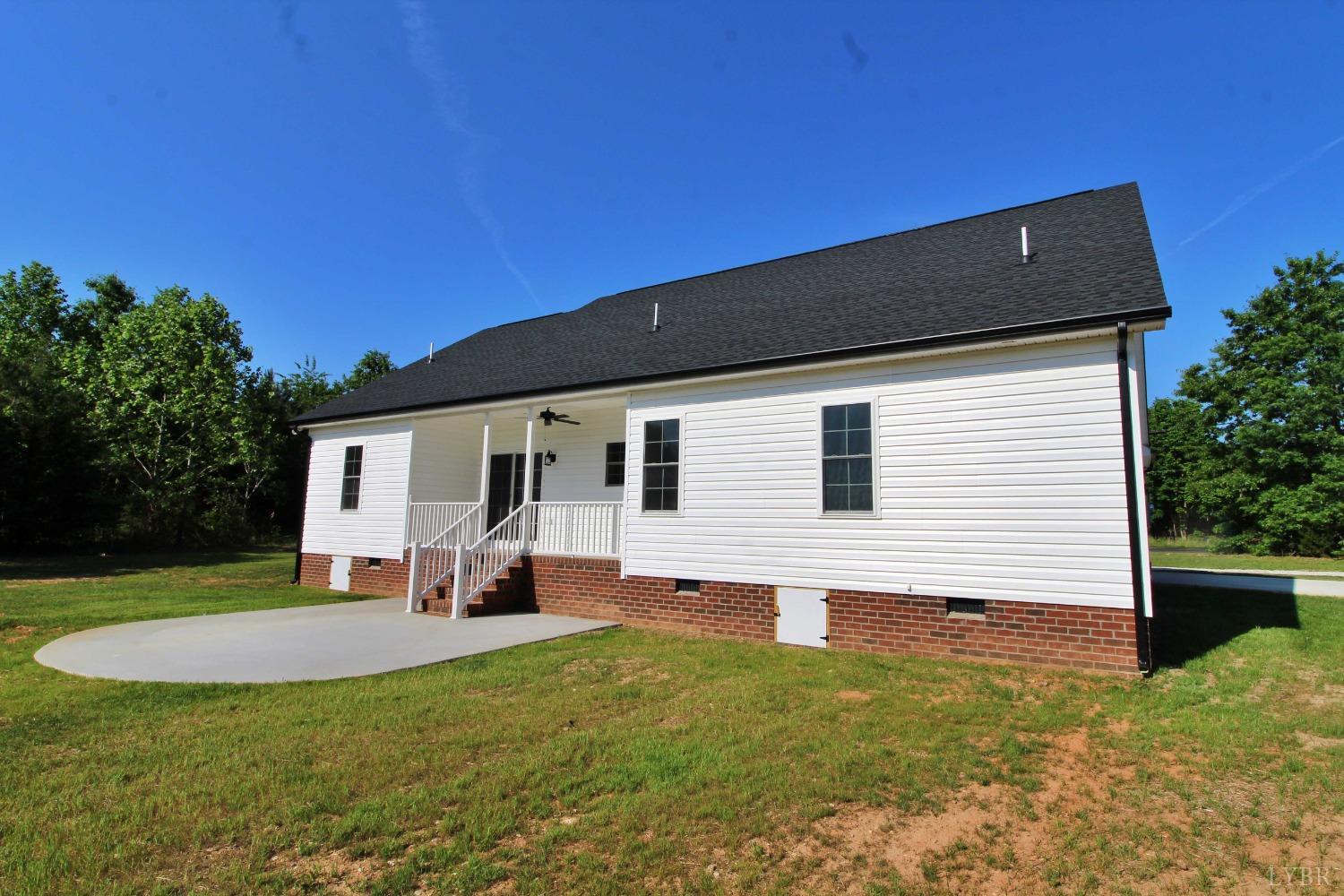 3370 Promise Land Road Appomattox, VA 24522 - Photo 5 of 29 a backyard of a house with seating space