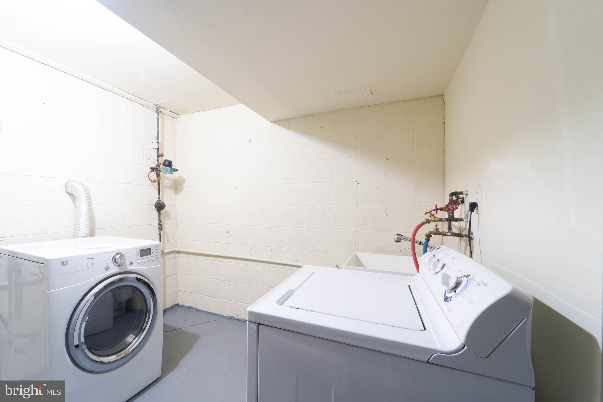 9318 Matador Road Columbia, MD 21045 - Photo 20 of 32 a utility room with dryer and washer