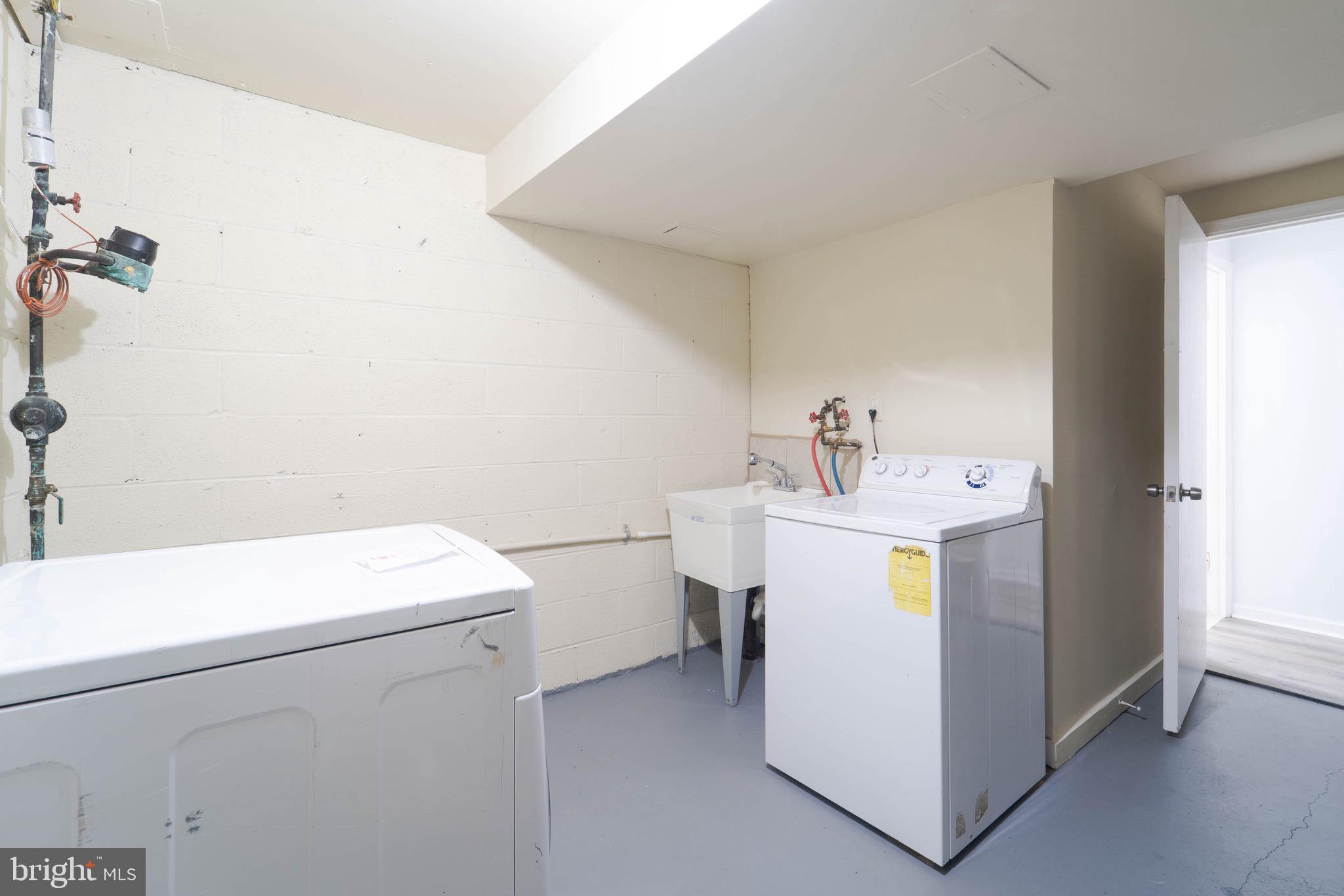 9318 Matador Road Columbia, MD 21045 - Photo 21 of 32 a utility room with dryer and washer