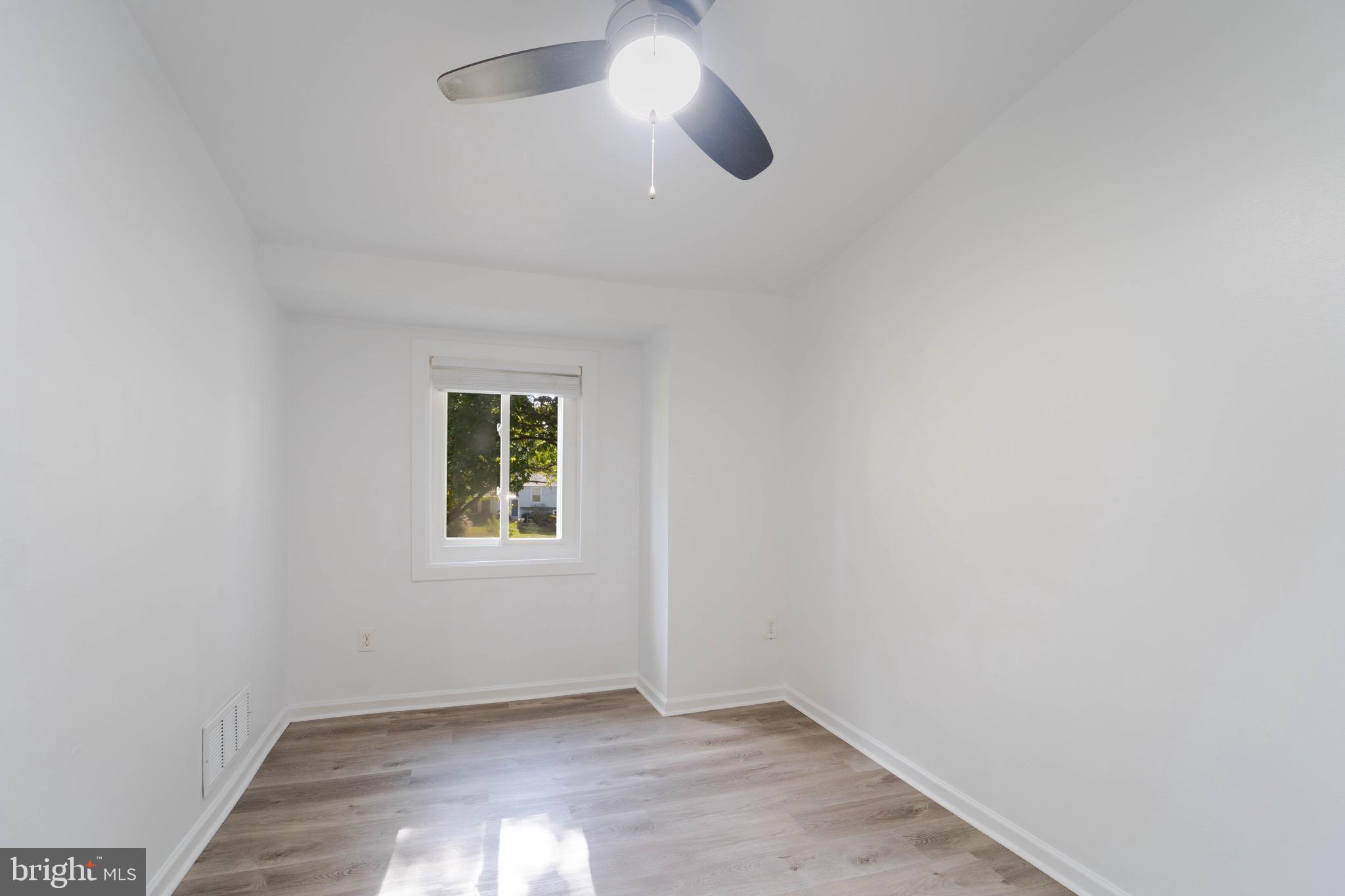 9318 Matador Road Columbia, MD 21045 - Photo 23 of 32 an empty room with a window