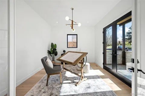 a view of a livingroom with furniture and windows