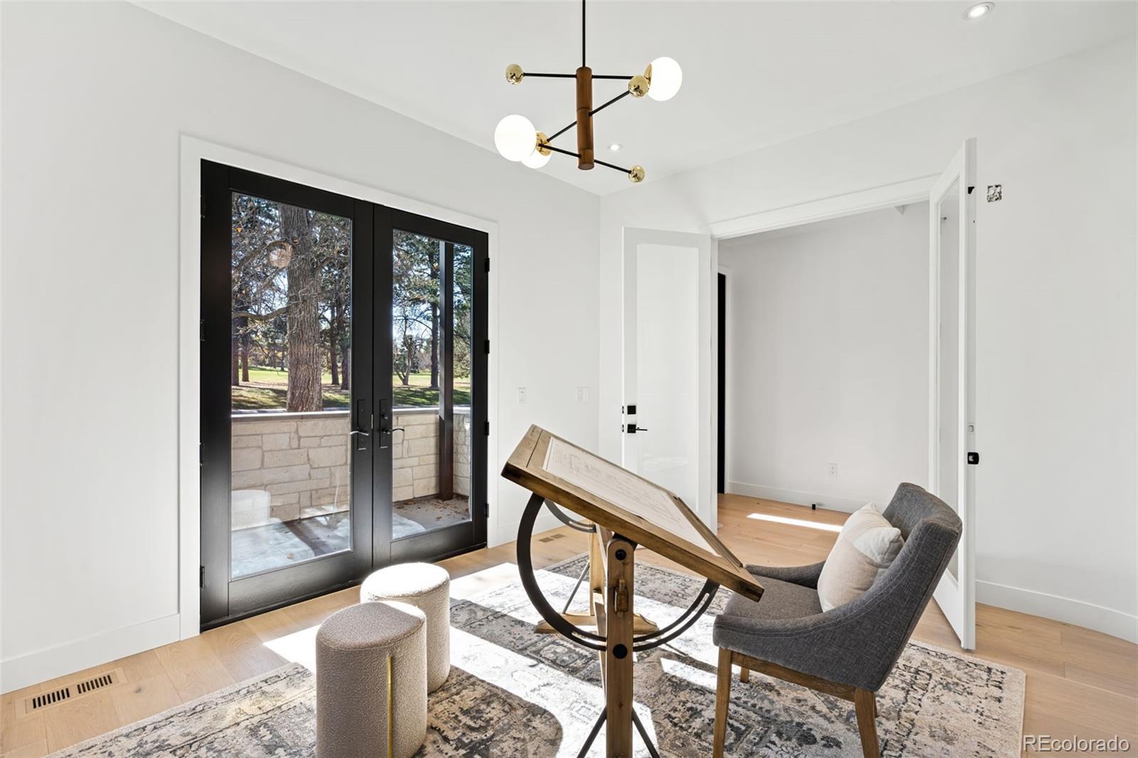 4645 Highline Place Denver, CO 80222 - Photo 15 of 48 a view of a livingroom with furniture and windows