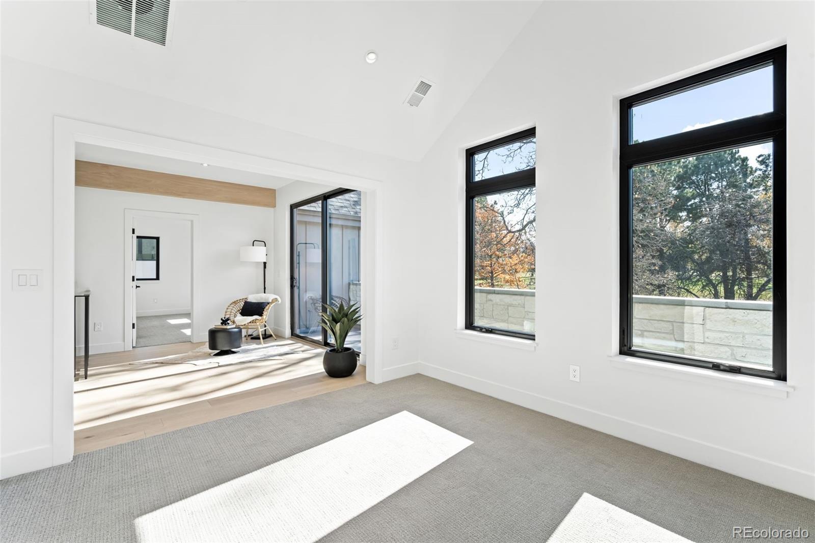 4645 Highline Place Denver, CO 80222 - Photo 18 of 48 a view of a livingroom with a dinning table and chair