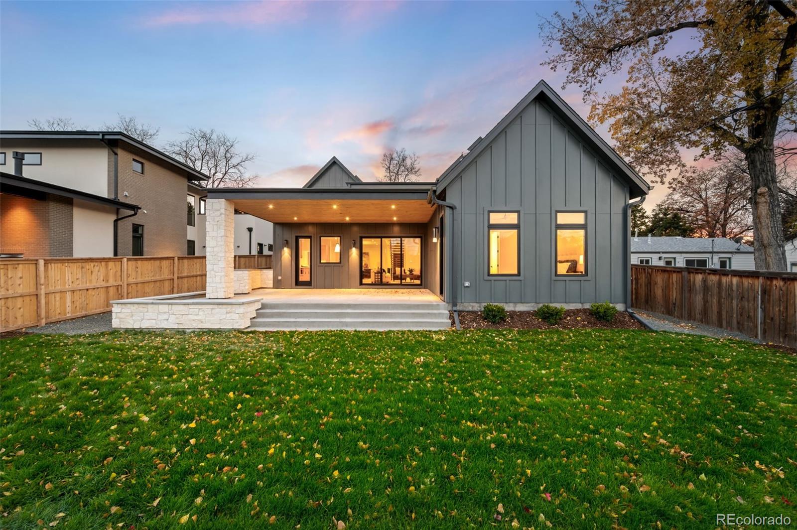 4645 Highline Place Denver, CO 80222 - Photo 3 of 48 a front view of a house with a yard