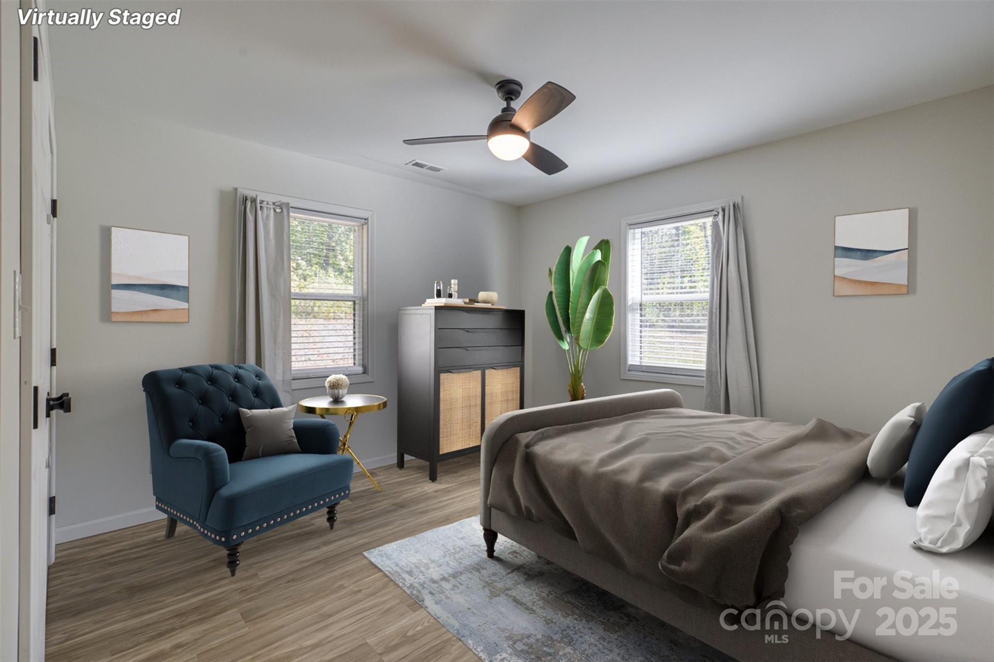 1173 Coffey Road Morganton, NC 28655 - Photo 14 of 26 a bedroom with a bed and wooden floor