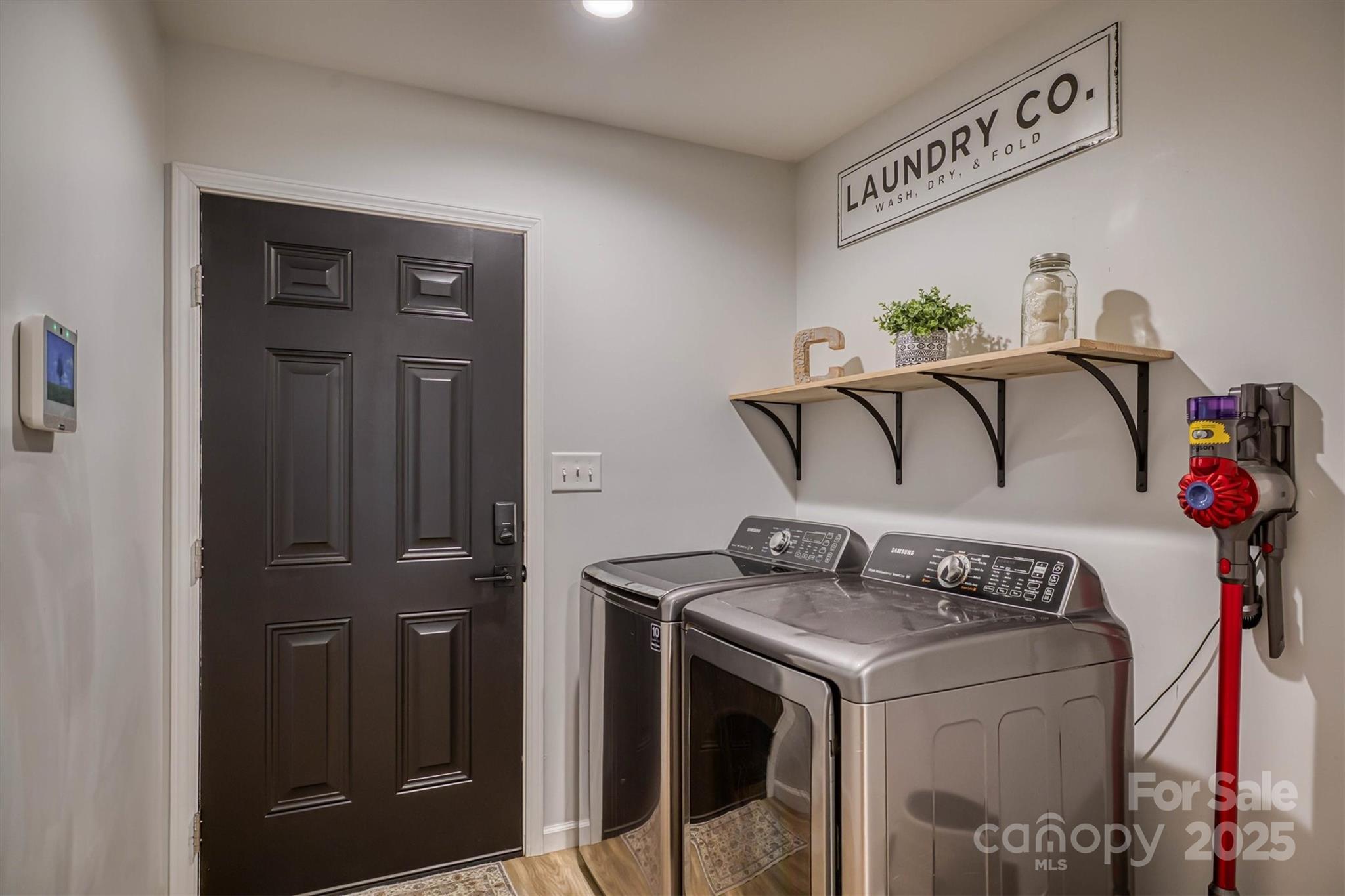 1173 Coffey Road Morganton, NC 28655 - Photo 18 of 26 a utility room with dryer and washer