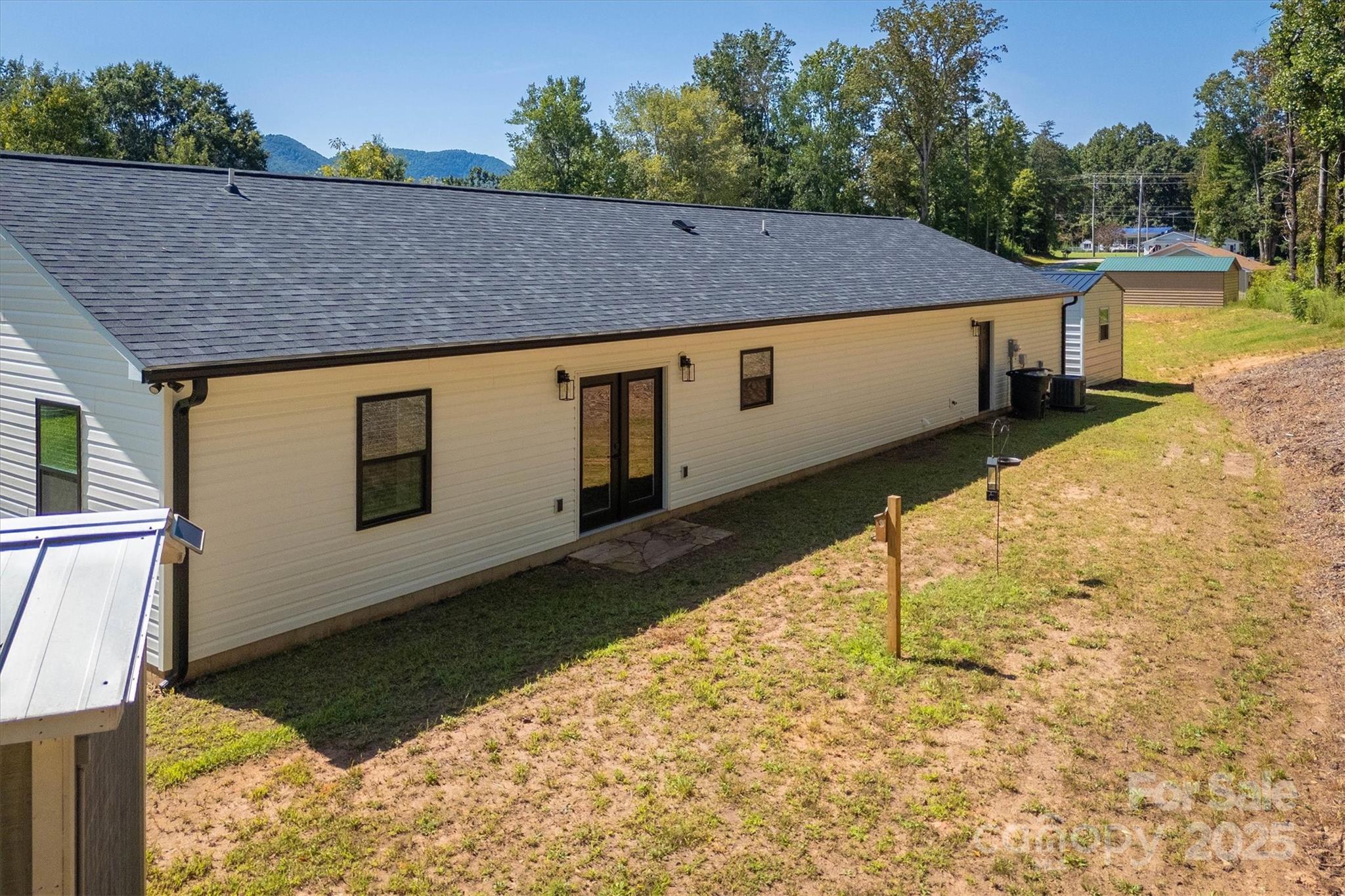 1173 Coffey Road Morganton, NC 28655 - Photo 20 of 26 a view of a house with backyard