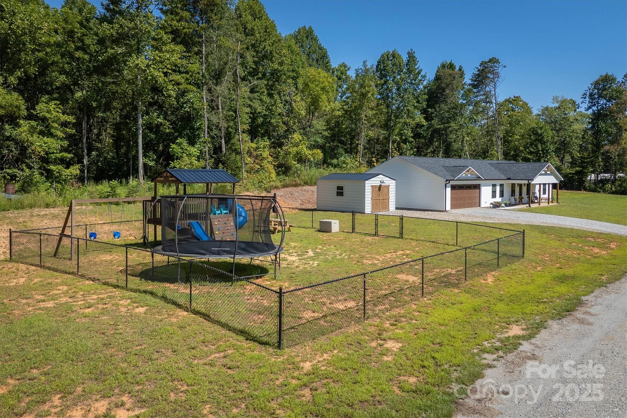 1173 Coffey Road Morganton, NC 28655 - Photo 21 of 26 a view of a house with backyard
