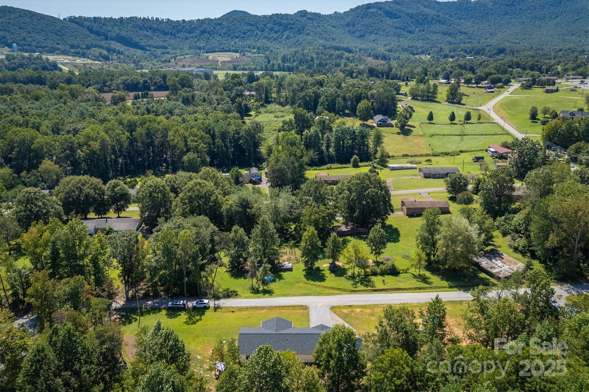 1173 Coffey Road Morganton, NC 28655 - Photo 24 of 26 an aerial view of residential house with outdoor space and swimming pool