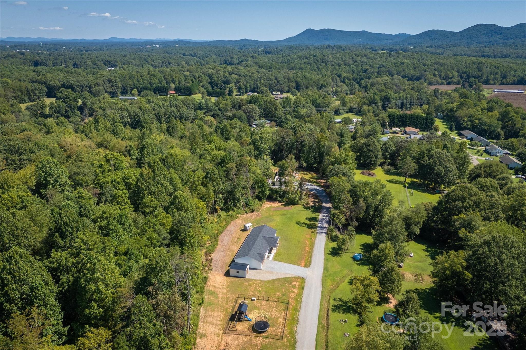 1173 Coffey Road Morganton, NC 28655 - Photo 25 of 26 an aerial view of residential house with outdoor space and trees all around