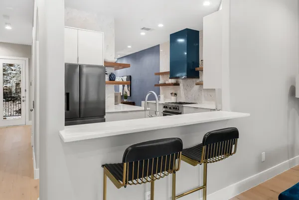 a view of livingroom with furniture and a window