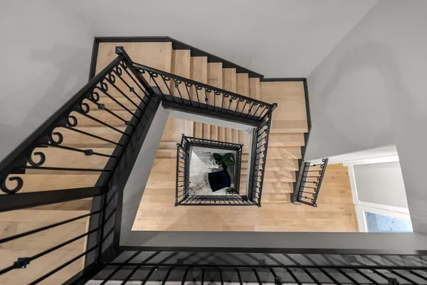 a view of a forest from a balcony