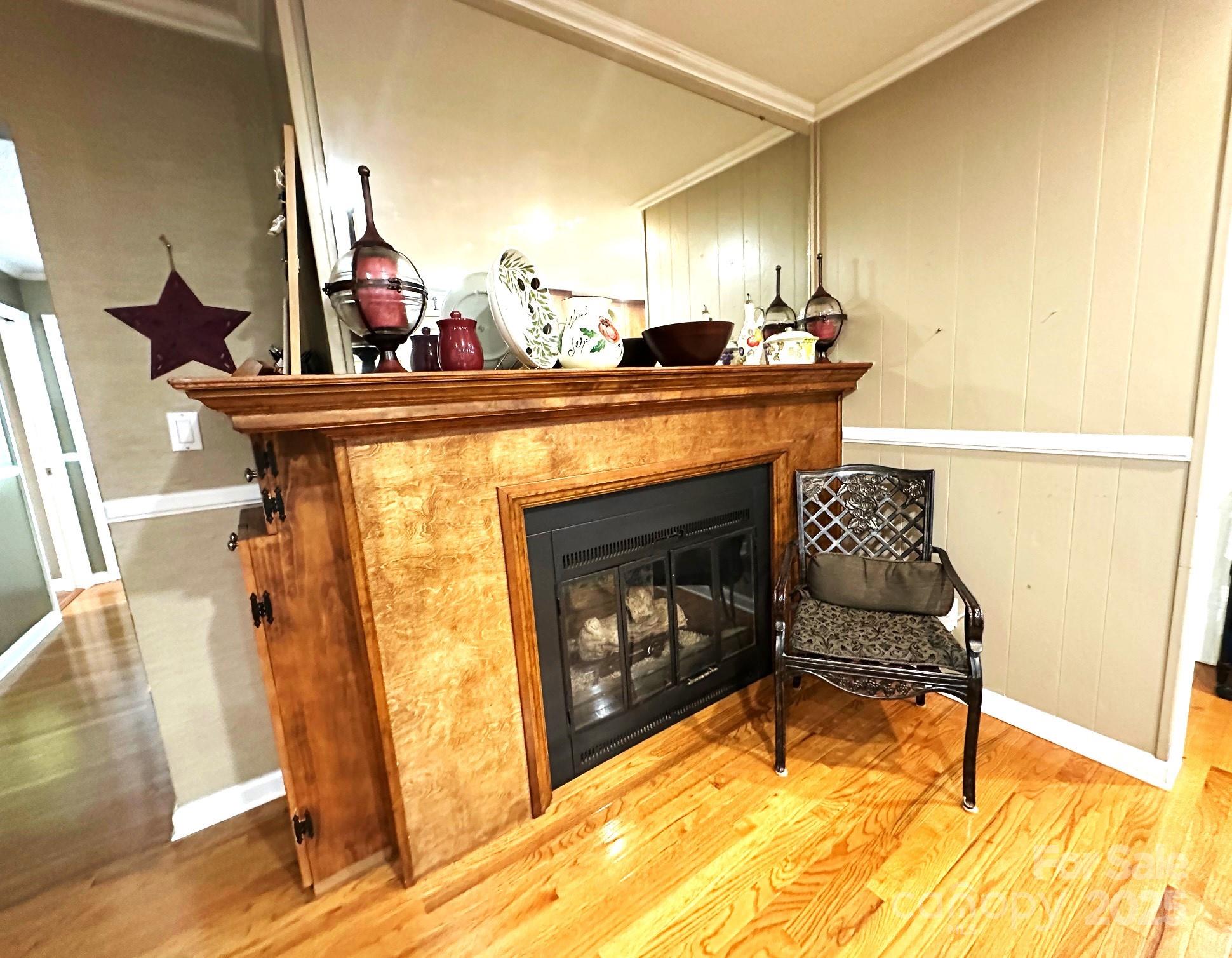 25 Norman Road Fletcher, NC 28732 - Photo 12 of 47 a living room with a sink furniture and a fireplace