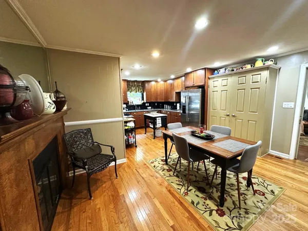 a view of a living room and dining room