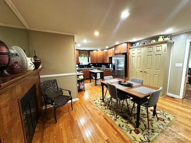 a view of a living room and dining room