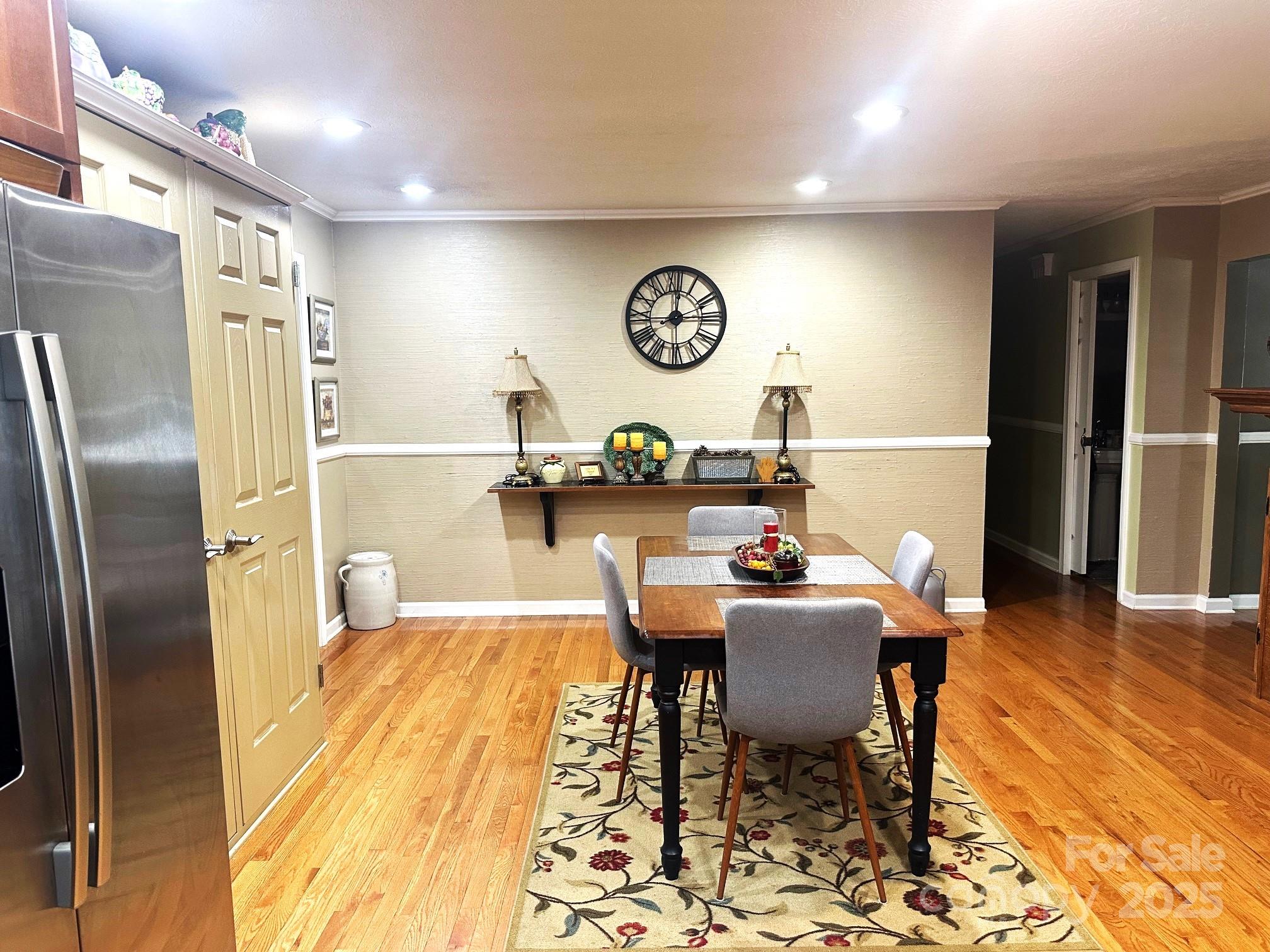 25 Norman Road Fletcher, NC 28732 - Photo 17 of 47 a dining room with a wooden table and chairs