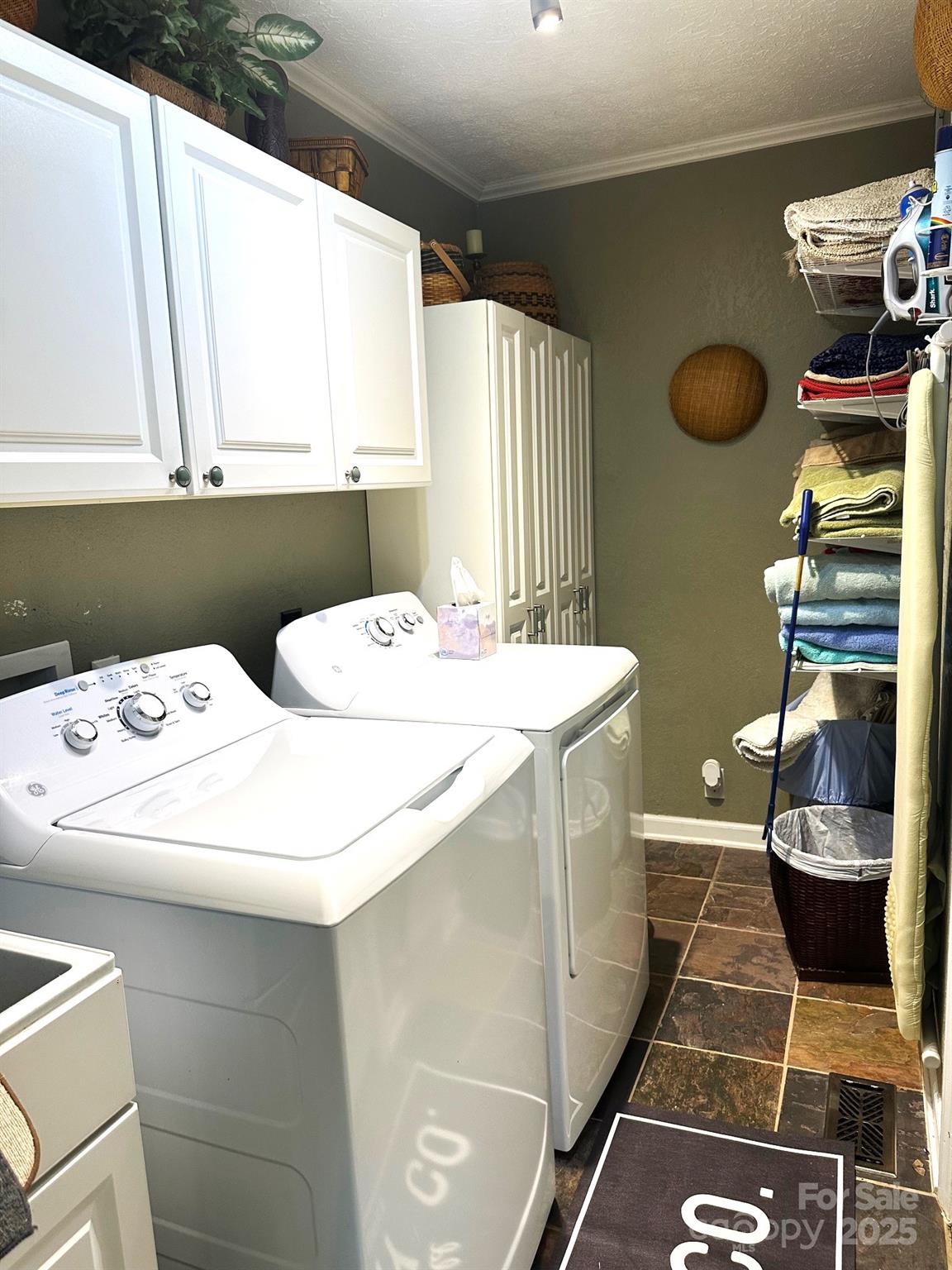 25 Norman Road Fletcher, NC 28732 - Photo 20 of 47 a bathroom with a sink and a mirror