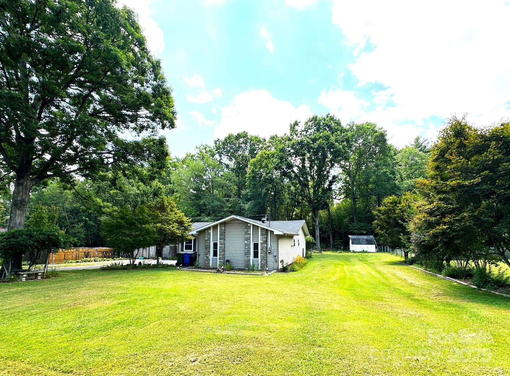 25 Norman Road Fletcher, NC 28732 - Photo 38 of 47 a view of a house with a yard
