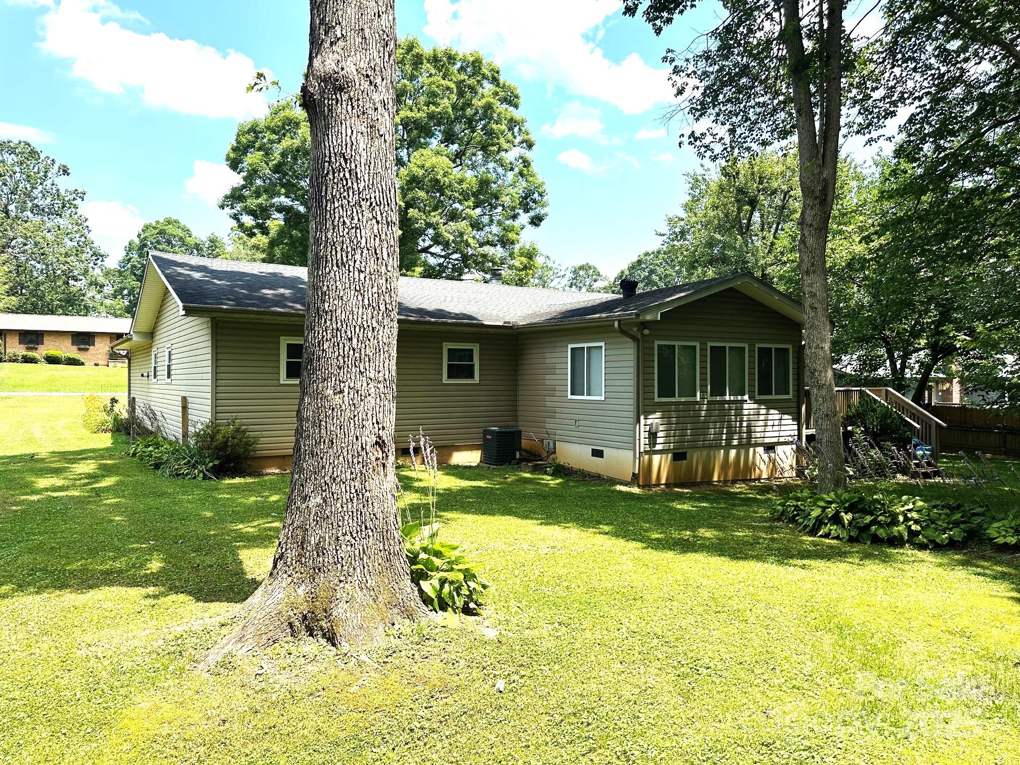 25 Norman Road Fletcher, NC 28732 - Photo 39 of 47 a view of a house with a yard patio and fire pit