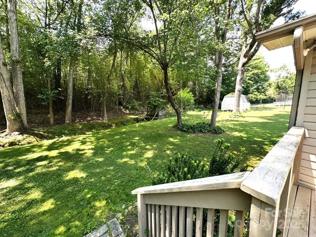 a view of backyard with green space