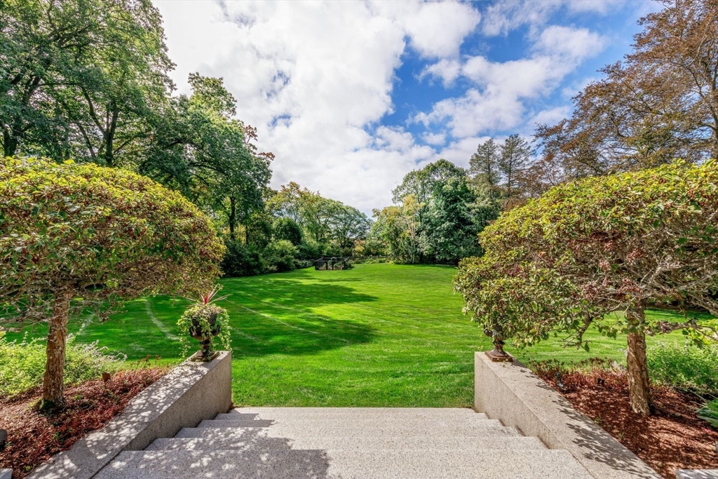 450 Summer Street Manchester, MA 01944 - Photo 2 of 42 a view of a garden with a pathway